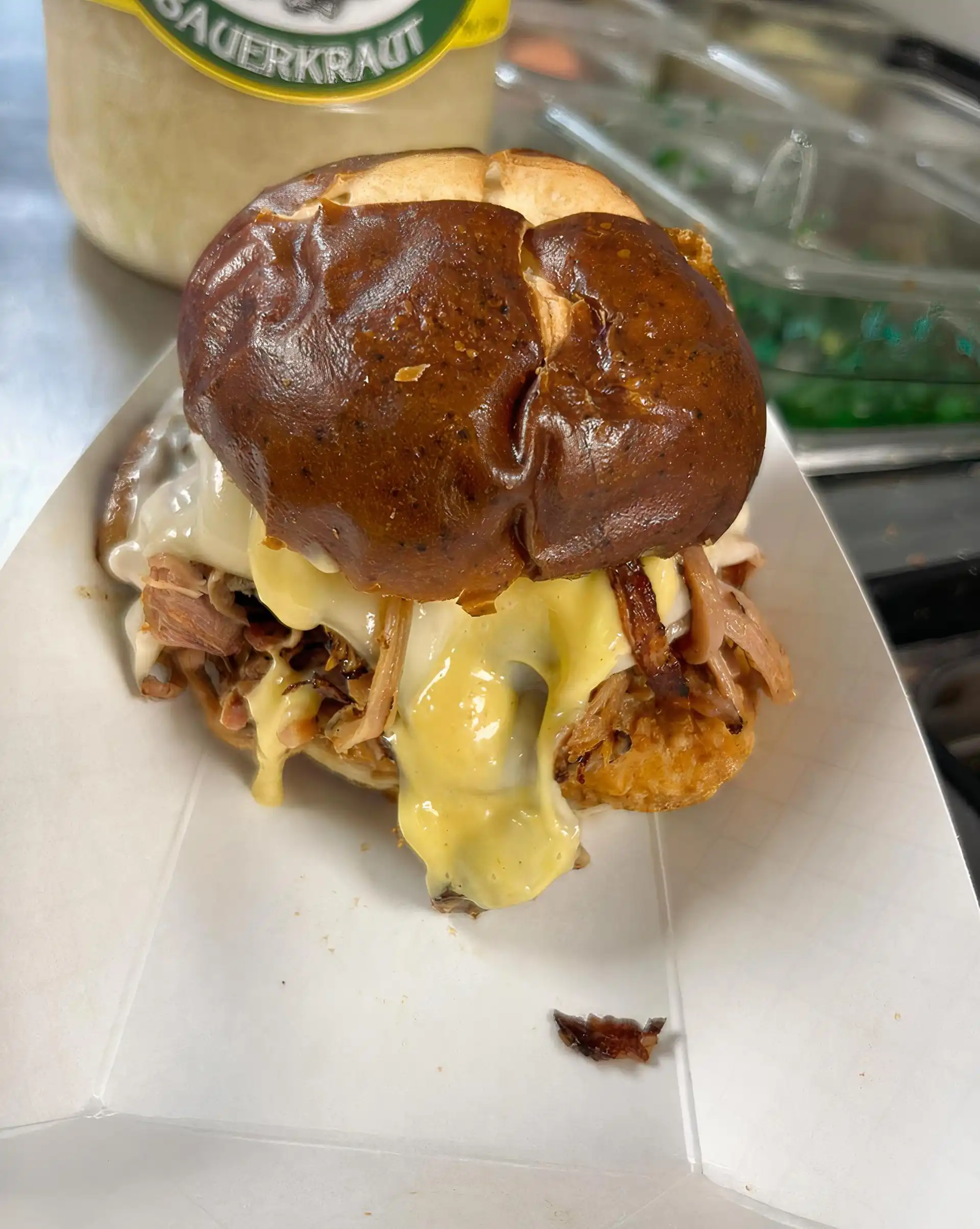 Fried 6 oz. Chicken Breast served on a Pretzel Bun, with twice smoked pulled ham, swiss cheese, and House Made Honey Mustard